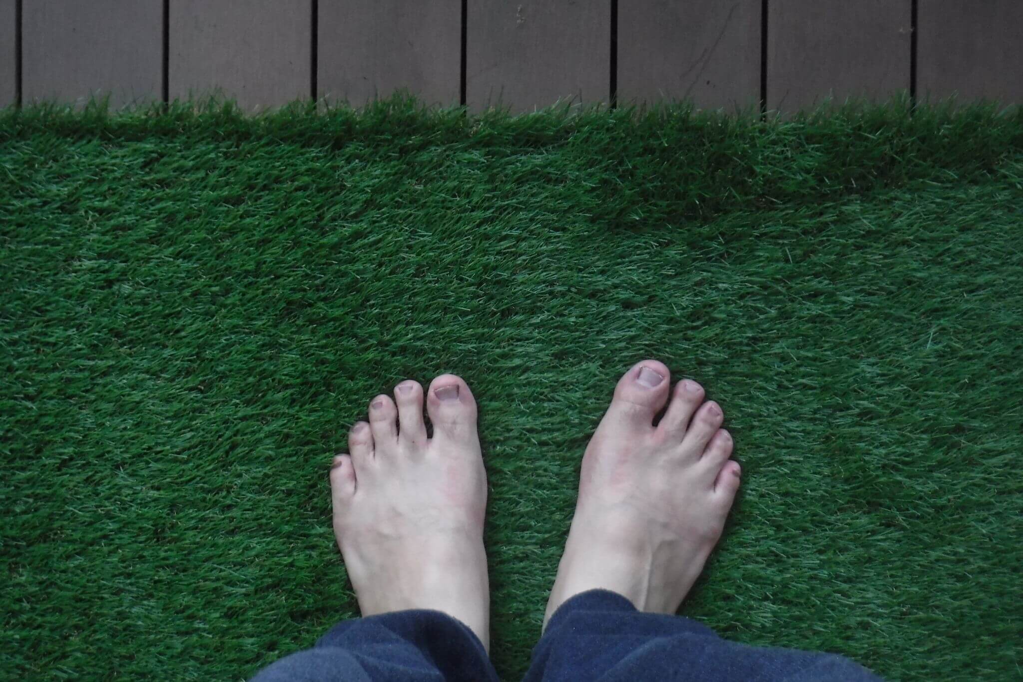 Man barefoot outdoors